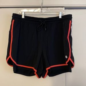 Torrid Active Shorts with pink trim